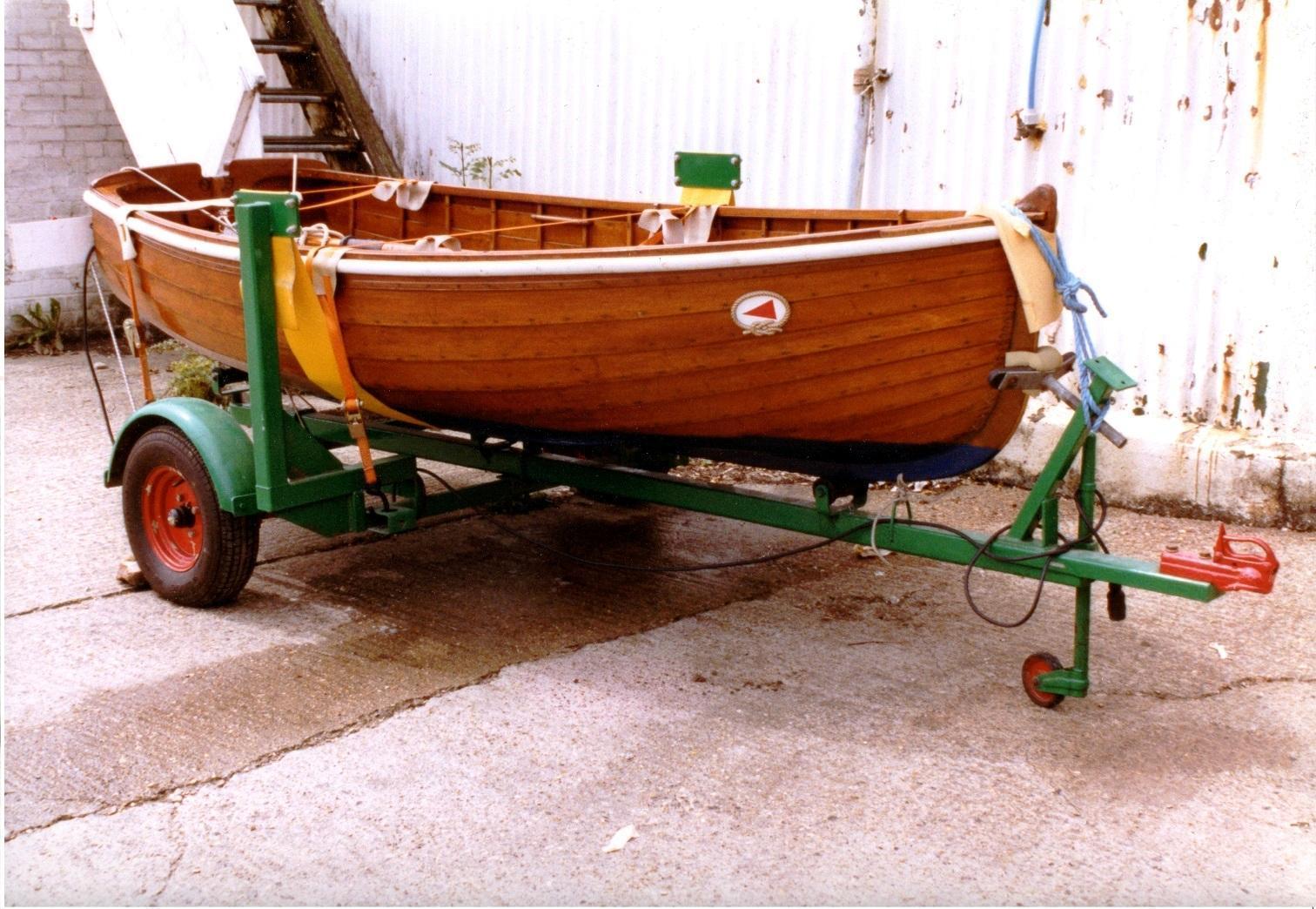 Varnished clinker Rowing dinghy, River Thames, Berkshire